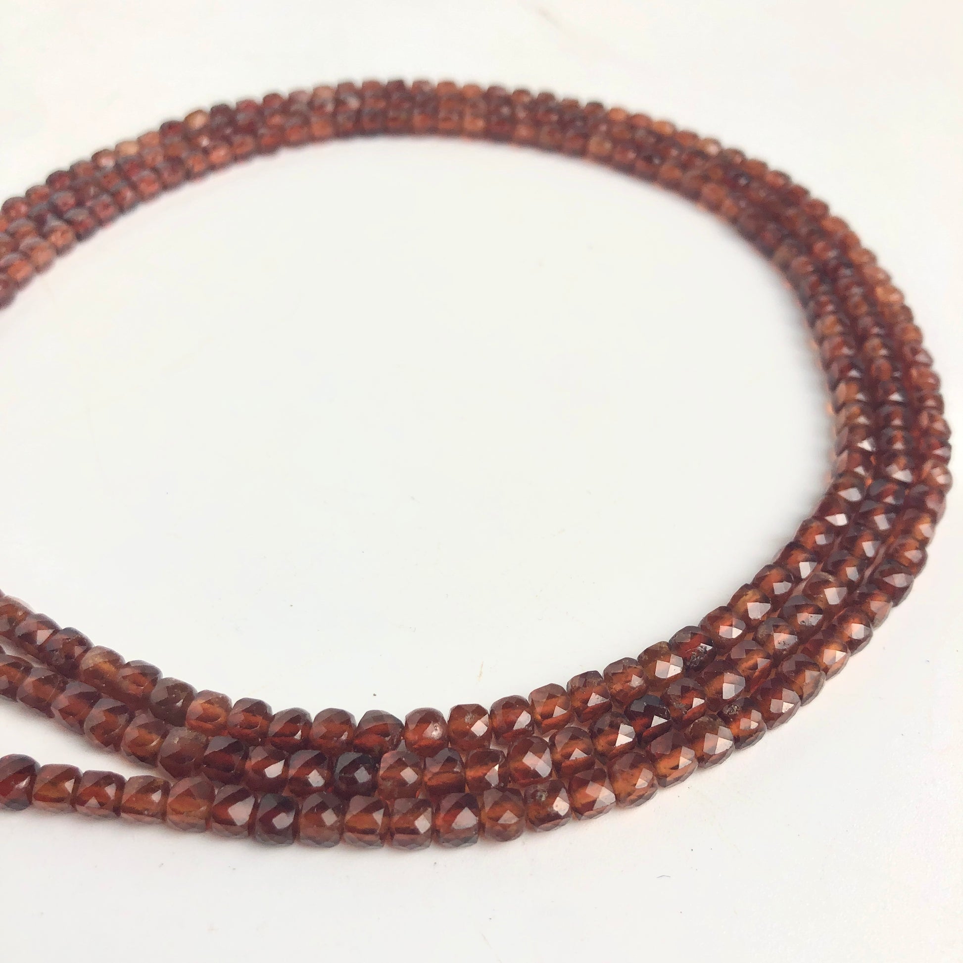 Hessonite Faceted Cubic Beads, 4mm - Shakti